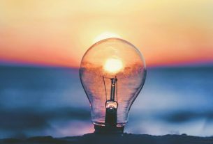 selective focus photography of light bulb